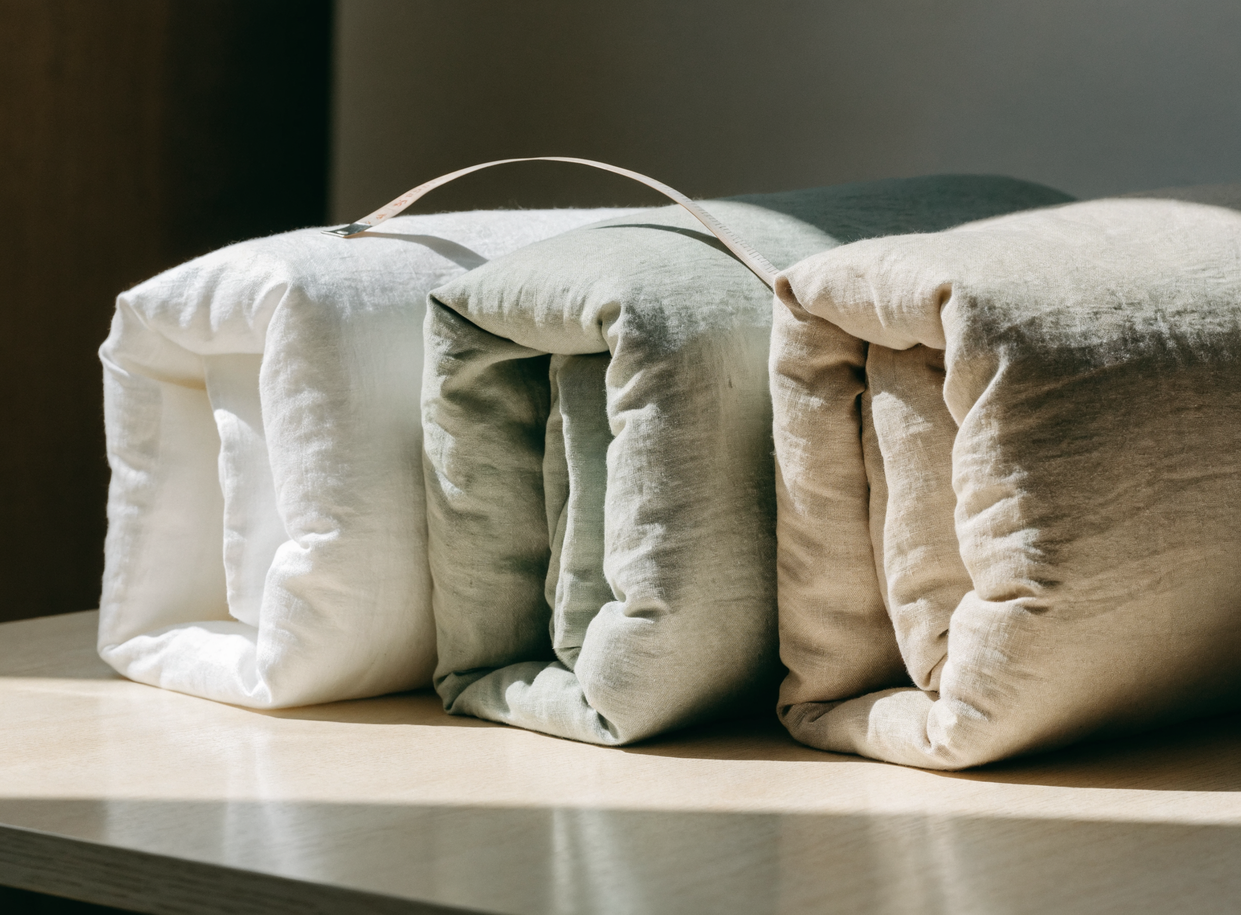 Housses de couette pliées par taille avec un mètre ruban