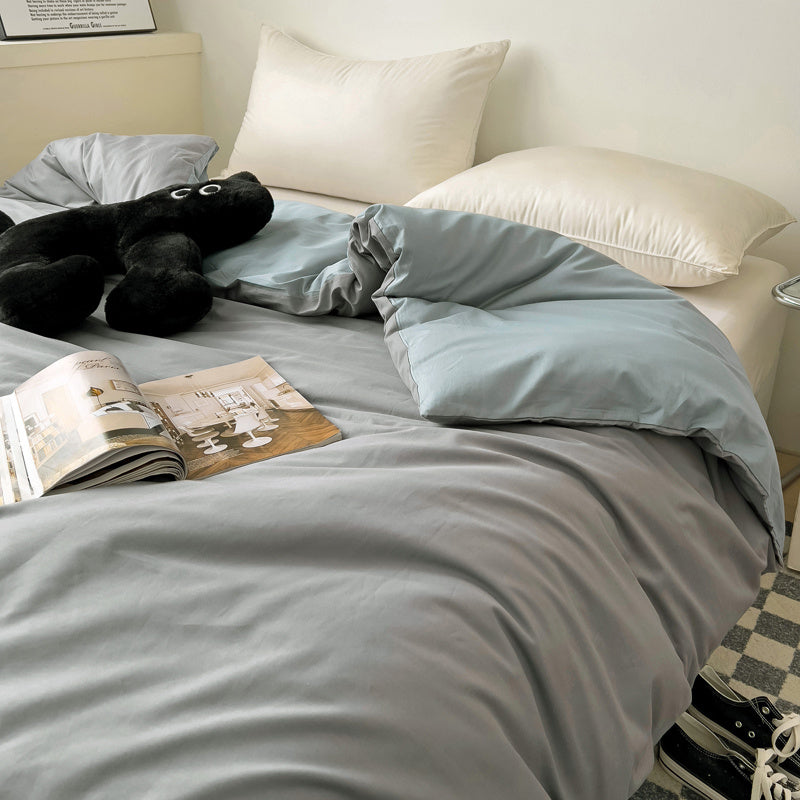 Housse de couette réversible en coton gris uni, revers bleu