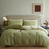 Housse de couette réversible vert tendre et crème, coton